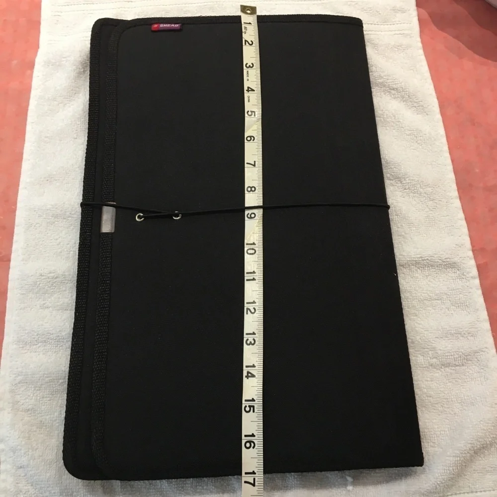 Portfolio legal size in black material. NWOT